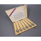 A cased set of six silver gilt facsimile Coronation Anointing spoon coffee spoons, London 1936
