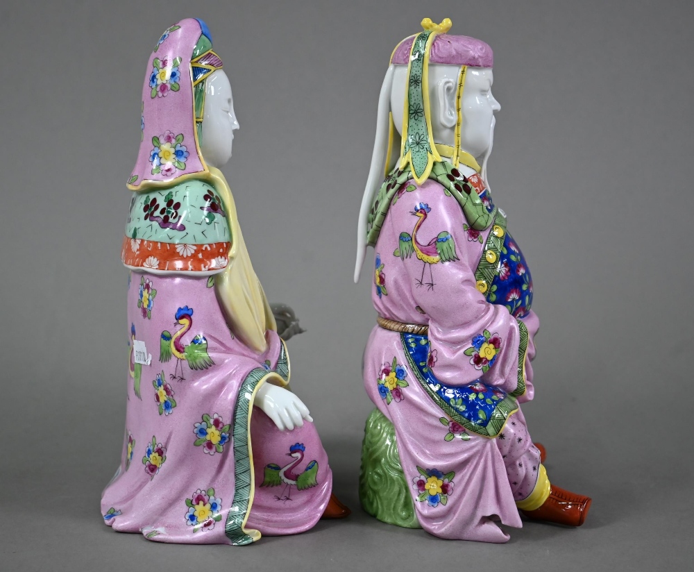 A pair of Dresden figures of a Chinese couple in pink official's robes painted with flowers and - Image 3 of 9