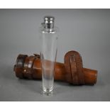 A vintage conical glass spirit flask with hinged ep bun cover, in stitched leather case, 24 cm long