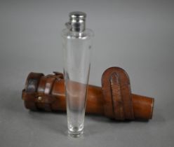 A vintage conical glass spirit flask with hinged ep bun cover, in stitched leather case, 24 cm long