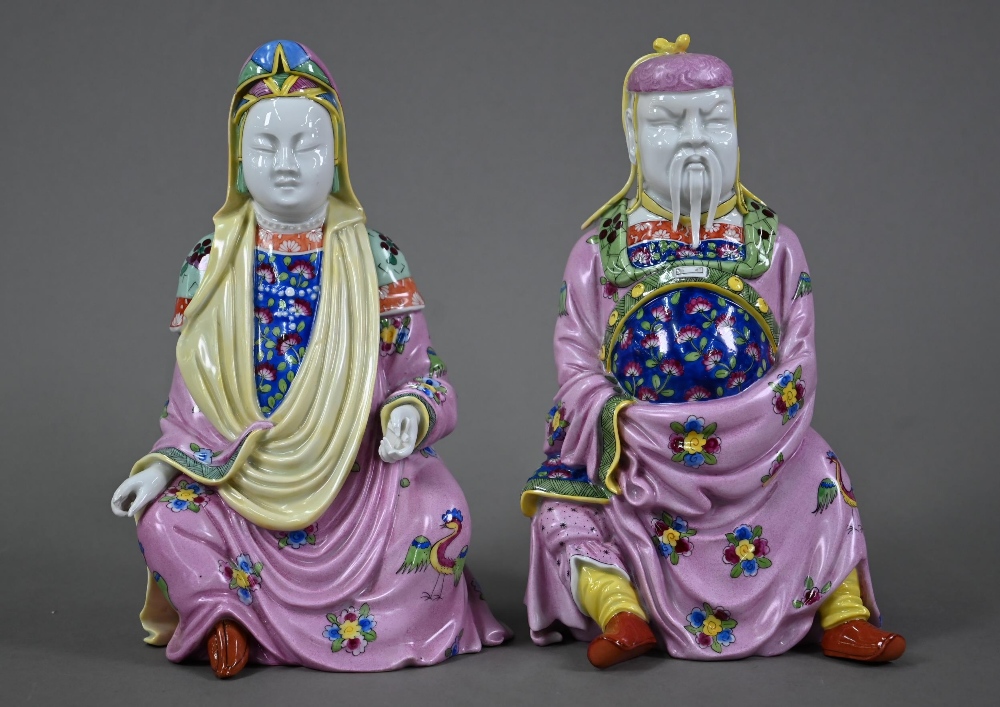 A pair of Dresden figures of a Chinese couple in pink official's robes painted with flowers and - Image 2 of 9