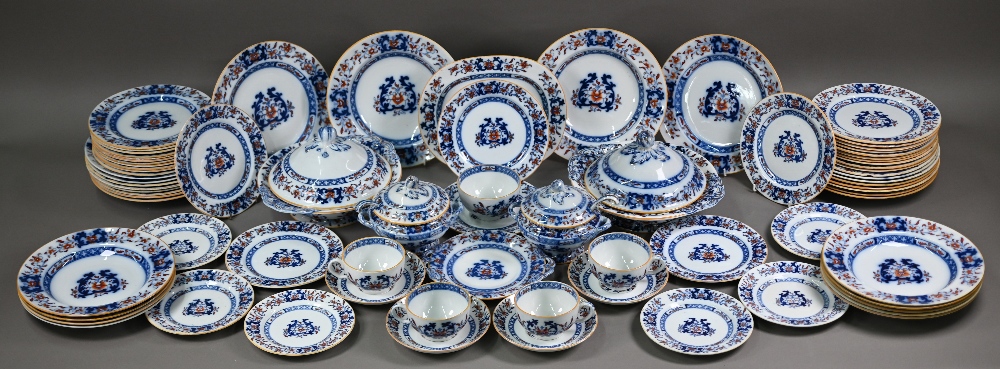 A late Victorian Minton pottery dinner service, printed and painted with blue and iron-red floral