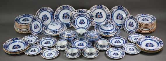 A late Victorian Minton pottery dinner service, printed and painted with blue and iron-red floral