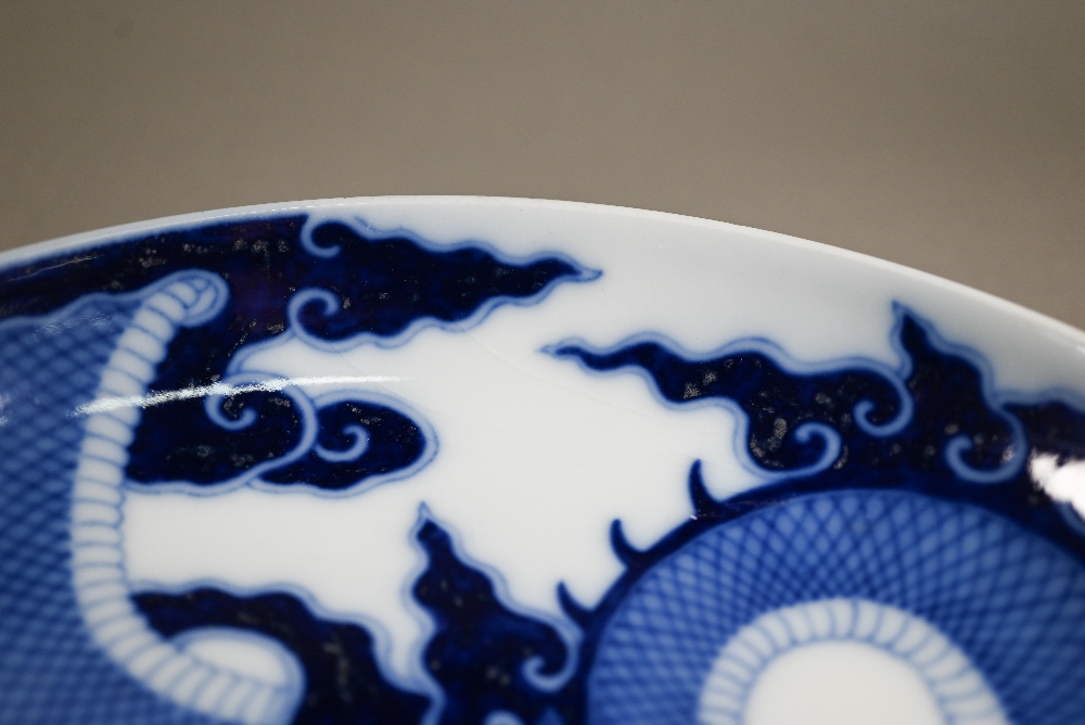 A Chinese transitional style blue and white dragon charger in the mid 17th century manner, painted - Image 8 of 8