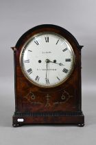 T Snow, Knaresborough, a Regency brass inlaid mahogany cased 8-day repeat twin fusee bracket