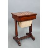 A Victorian satinwood work table, the chequerboard top over a frieze drawer and pleated silt storage