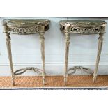 A pair of antique continental carved lime wood demi-lune console tables, the (loose) tops with