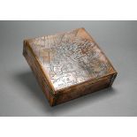 A World War II brass cigar box, the cover engraved with 'V-E World War II Battlefields of Europe',