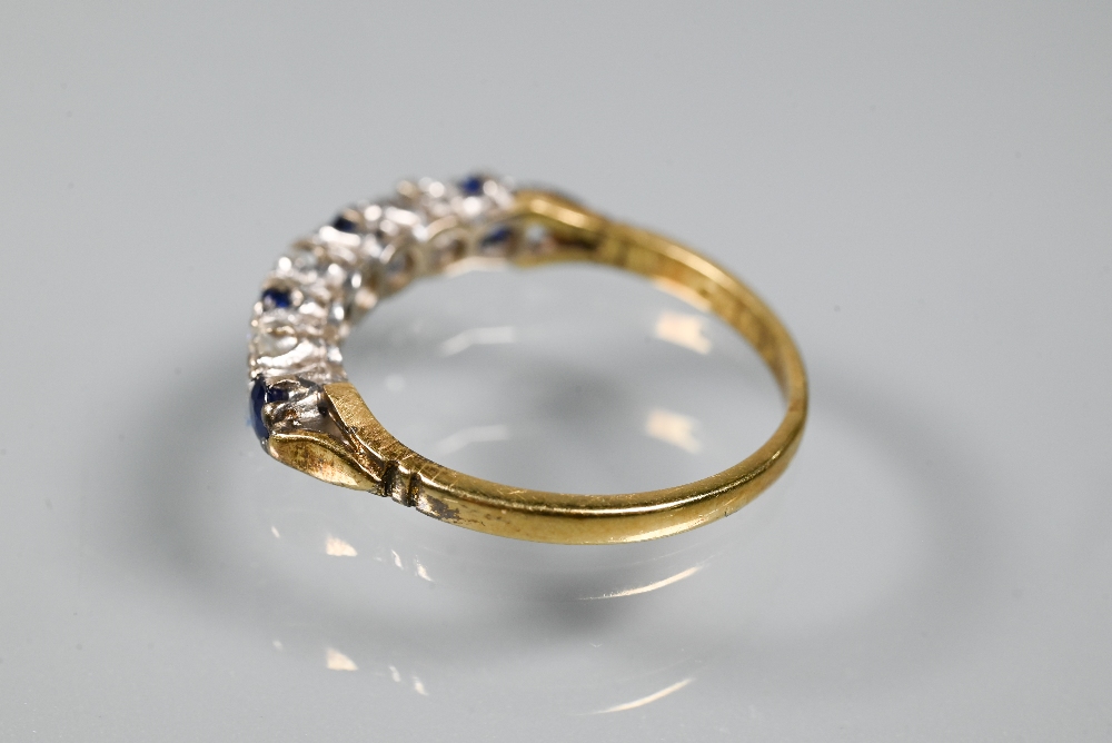 An 18ct yellow gold ring set with three oval blue sapphires with two diamonds between, size P to/w a - Image 4 of 6