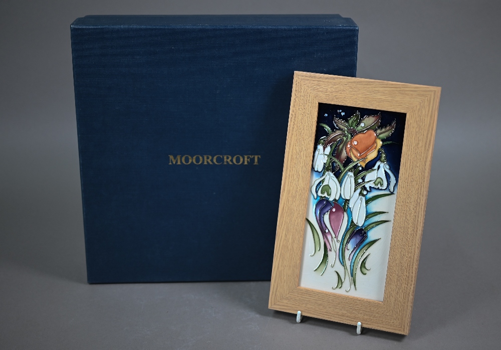 A boxed Moorcroft 'Snowtime' plaque by Emma Bossons, 2010, 20 x 10 cm, in oak frame