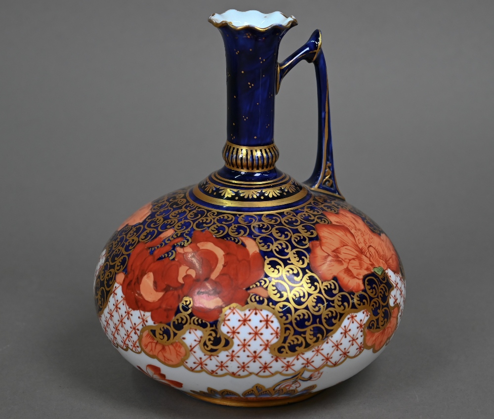 A Victorian Royal Crown Derby onion-shaped ewer, decorated in the Imari palette with gilding, 1885/