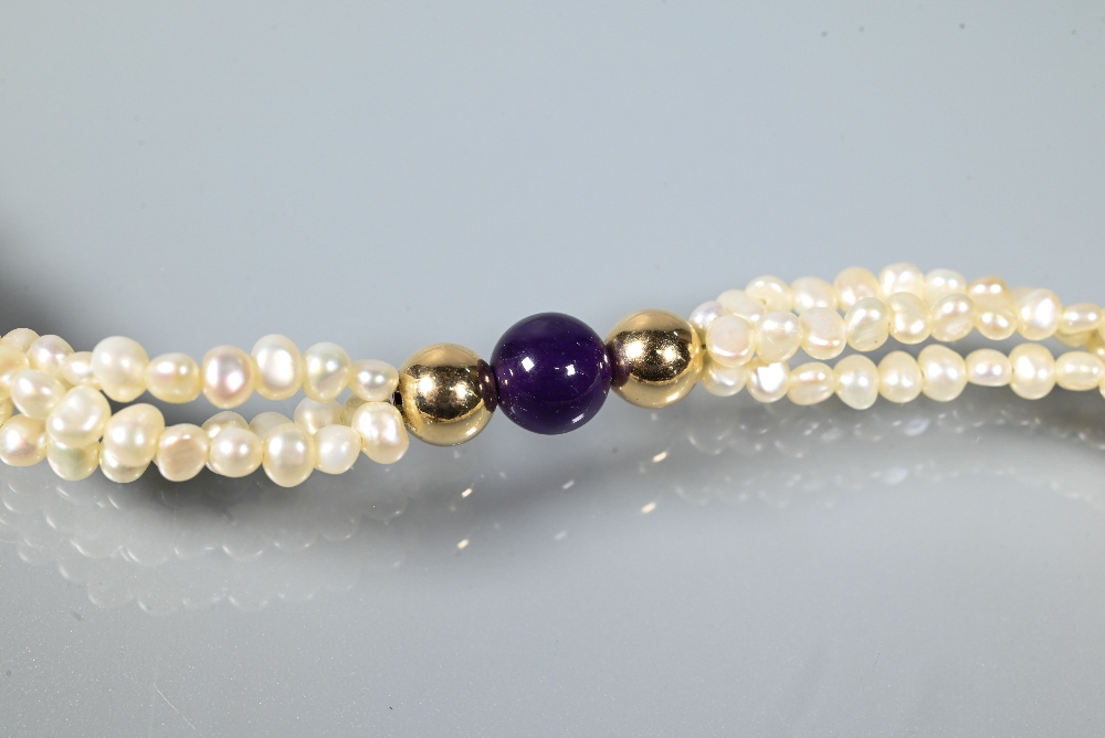 A pearl necklace comprising a triple row of river pearls with hardstone beads and heart to centre, - Image 5 of 5