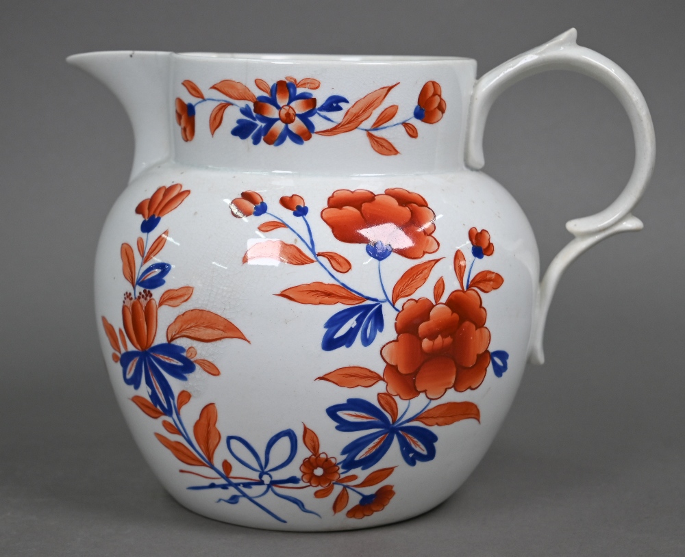 An early 19th century stoneware large jug with floral painted decoration in iron red and blue - Image 2 of 2