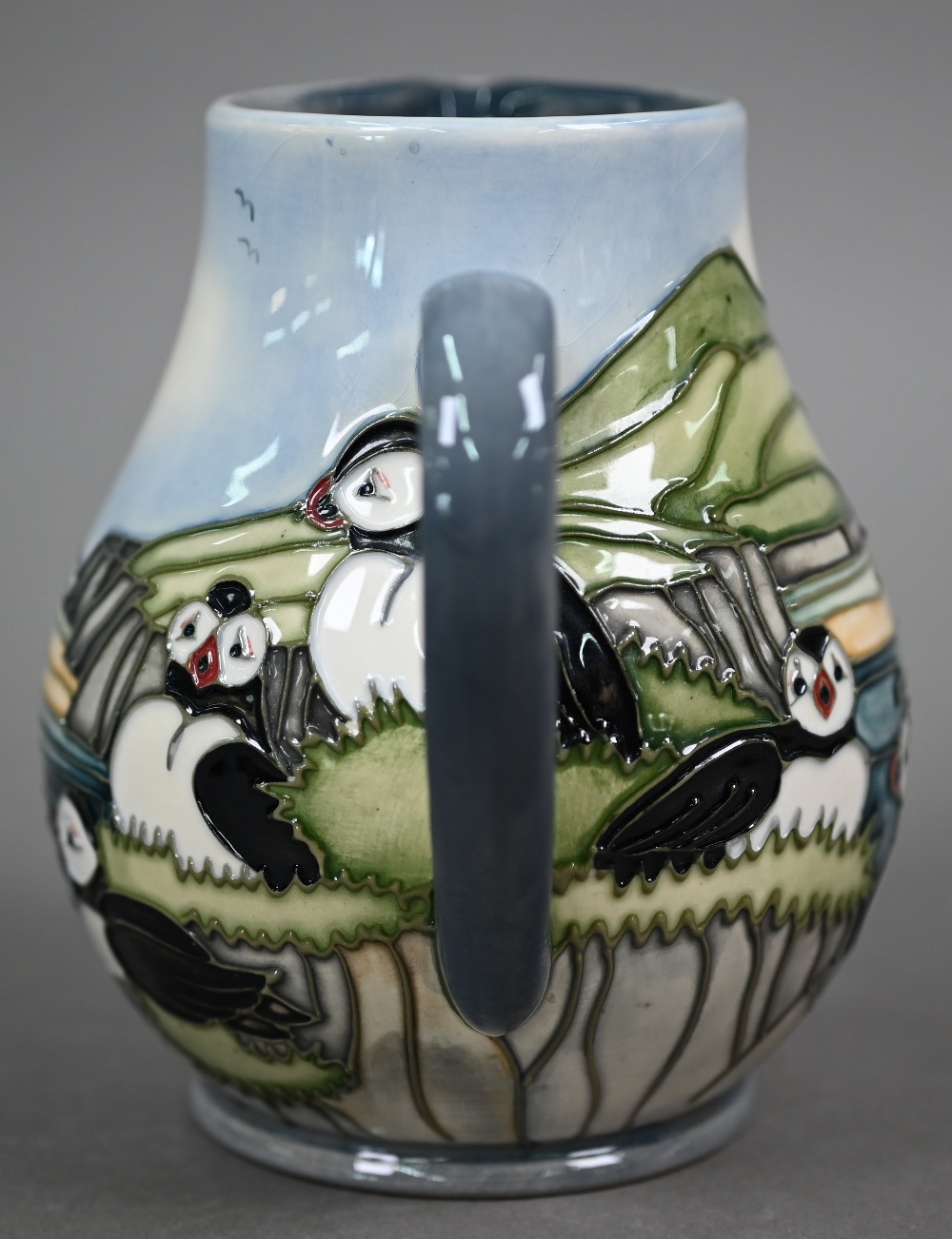 A boxed Moorcroft 'Puffins' jug by Carol Lovett, 14 cm - Image 6 of 6