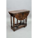 A small 17th/18th century joint oak gateleg table, 69 x 33 x 61.5 cm high