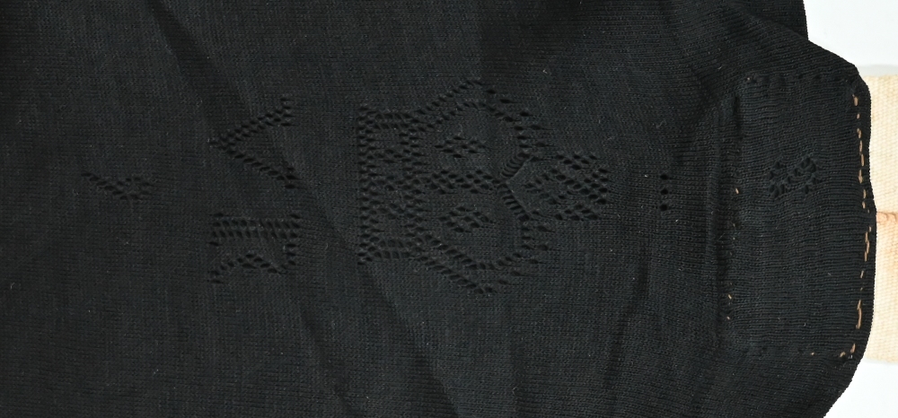 A pair of black silk stockings, the property of Queen Victoria, with drawn thread crowned 'VR' - Image 6 of 8
