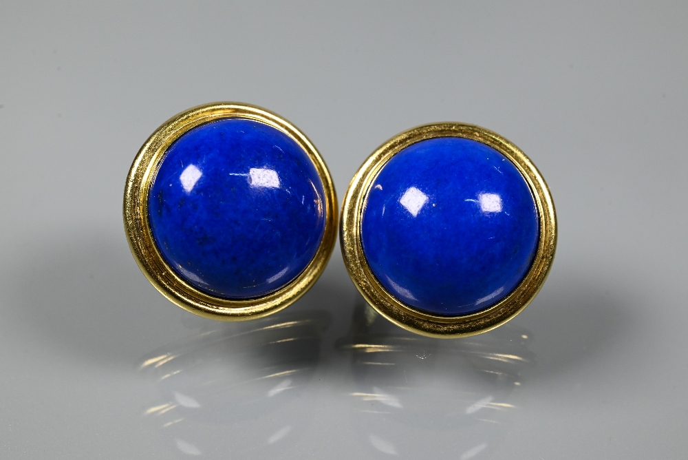 Pair of ear-clips set round half-domed lapis lazuli approx 1.5 cm diam, set yellow metal stamped