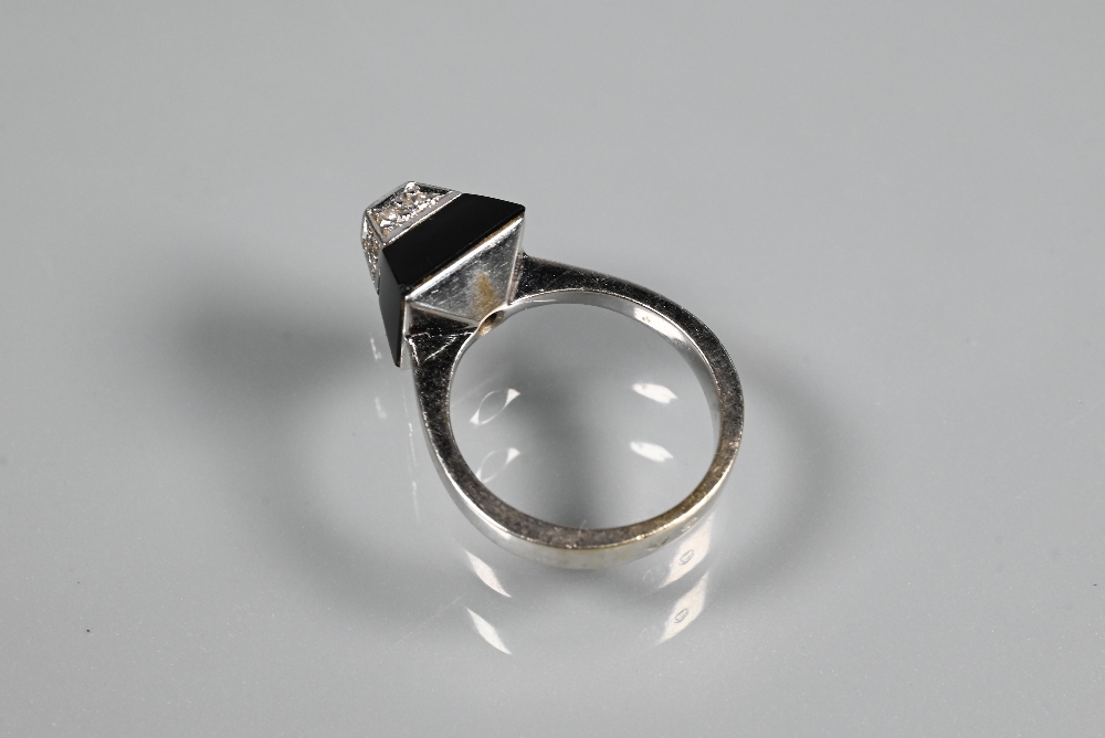 An Art Deco style diamond and onyx ring of geometric form, unmarked white metal set, size K 1/2 - Image 4 of 5