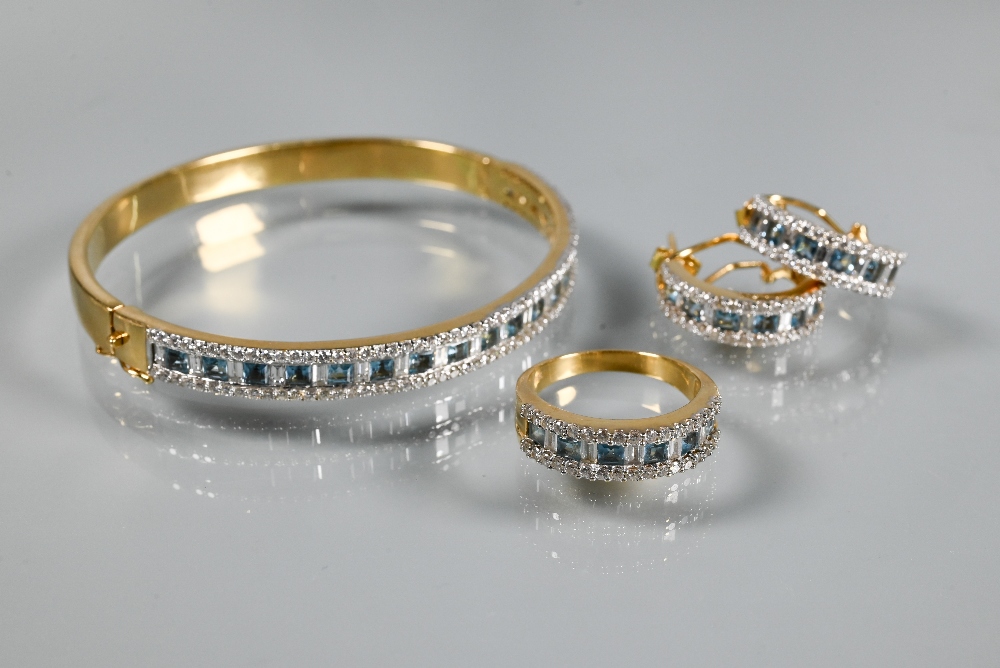 A diamond and blue topaz suite comprising half-hinged bangle with alternate channel-set diamonds and - Image 2 of 8