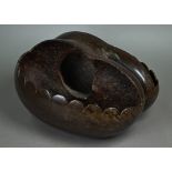 A carved coco de mer basket, 30 x 26 cm