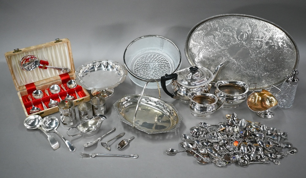 An epns three-piece tea service, a comport, oval tray, sugar scuttle, souvenir spoons, etc. (box)