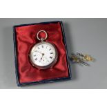 A silver cased pocket watch, the rear wind key movement with white enamelled dial incorporating