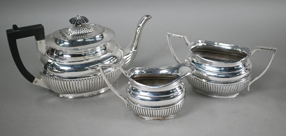 A plated on copper circular tray, to/w a half-reeded three-piece tea service, a hot water jug and - Image 3 of 4