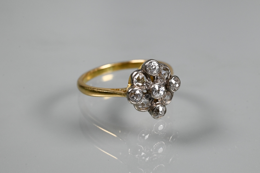An antique diamond cluster ring formed of nine mixed cut diamonds, yellow and white gold set, size M - Image 2 of 4