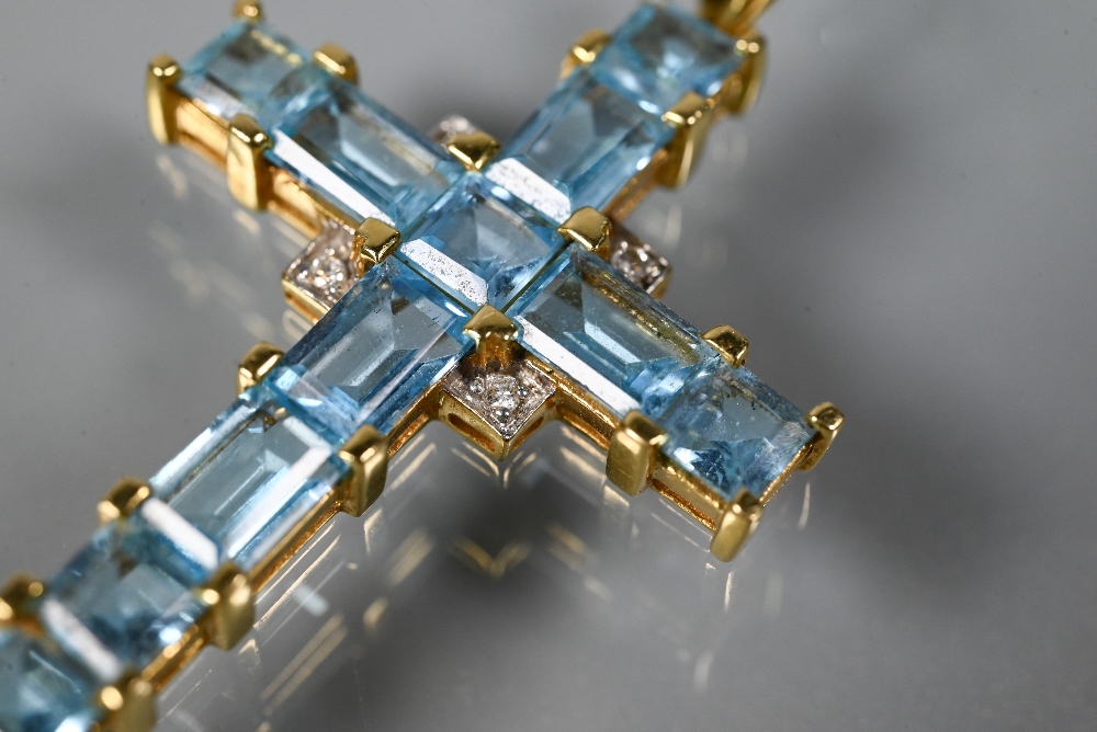 A cross-shaped pendant set overall with square and rectangular cut blue topaz, diamond set centre, - Image 4 of 6
