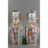 A pair of 19th century Chinese Canton famille rose baluster vases with everted foliate rims, applied