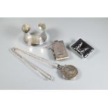 A white metal wide open cuff with hammered decoration, stamped 925; a silver-mounted notebook and