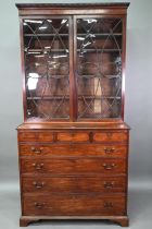 George III mahogany secretaire bookcase, the associated astragal glazed upper part over a fitted