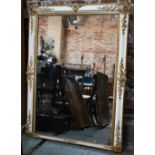 A 19th century Italian parcel gilt and white framed over-mantel, with original mirrored plate, 142