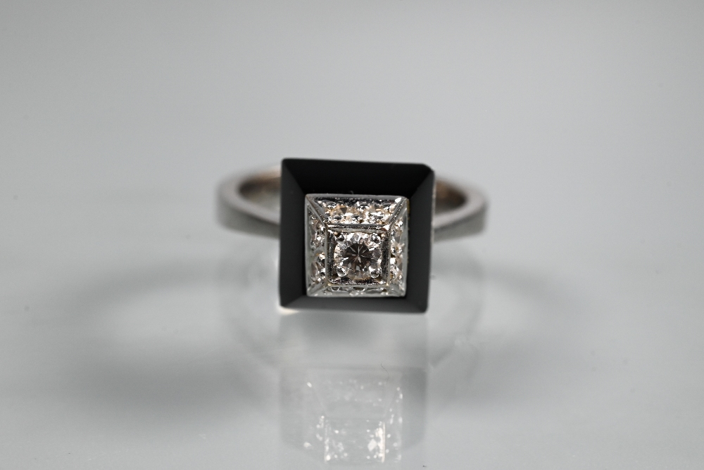 An Art Deco style diamond and onyx ring of geometric form, unmarked white metal set, size K 1/2 - Image 3 of 5