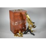 A lacquered brass microscope by Henry Crouch, London, no 1494, in fitted case with optics and