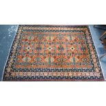 A fine North West Persian Ardebil rug, coral ground, 188 cm x 140 cm