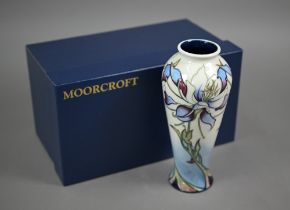 A boxed Moorcroft 'Petals in the Wind' vase by Nicola Slaney, 20.5 cm high