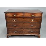 A Georgian mahogany chest of two short over three long graduated drawers, with brass fittings, on