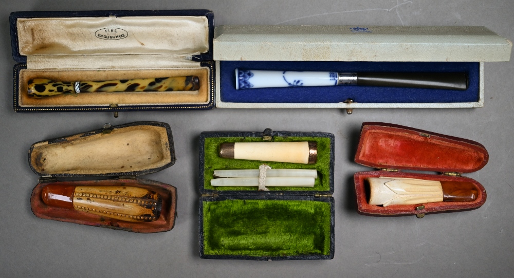 A selection of twelve cased cheroot/cigarette-holders, variously in amber, meerschaum, silver, - Image 3 of 10