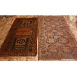 An old Afghan brown-red ground gul design rug, 207 cm x 117 cm to/with an old Belouch rug, brown-red