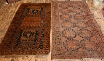 An old Afghan brown-red ground gul design rug, 207 cm x 117 cm to/with an old Belouch rug, brown-red