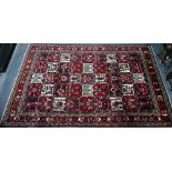 An old Persian Bakhtiar tile design rug, with differing floral motifs,  240 cm x 150 cm