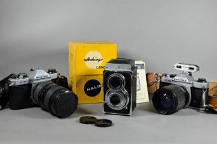 A boxed Halina AI twin lens reflex camera, to/w two Asahi Pentax K1000 slr cameras with Tokina S2-