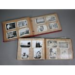 Two World War II albums of personal photographs depicting life aboard naval ships in the