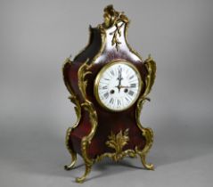 A 19th century gilt-metal mounted tortoiseshell mantel clock, the two train eight-day movement