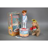 A boxed Japanese Haji tinplate battery operated 'Strutting My Fair Dancer', 28 cm (one arm f/r),