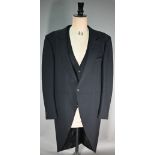 A black wool short jacket and matching waistcoat with square white metal buttons, size 52R (2)