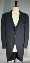 A black wool short jacket and matching waistcoat with square white metal buttons, size 52R (2)