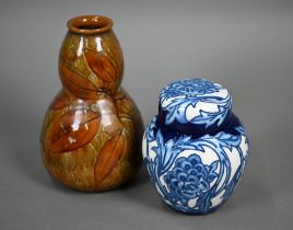 A Moorcroft Kelmscott Artichoke ginger jar and cover, 11 cm, to/w a Royal Doulton stoneware Autumn