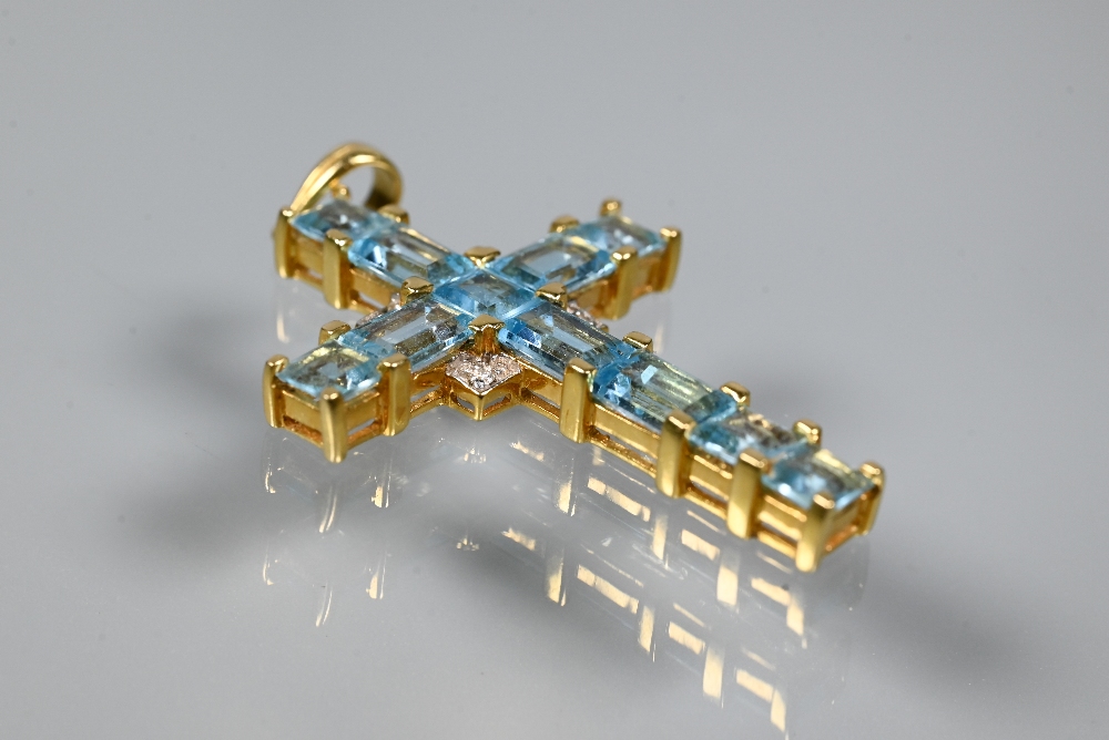 A cross-shaped pendant set overall with square and rectangular cut blue topaz, diamond set centre, - Image 3 of 6